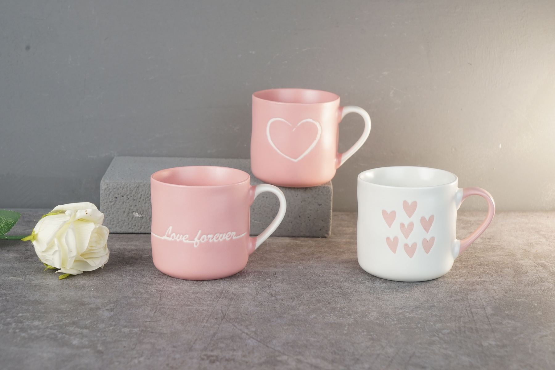 new bone china pink color mug embossed with heart design
