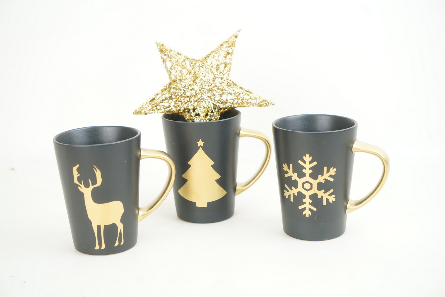 Stoneware conical mug matte black color electroplated with Xmas design