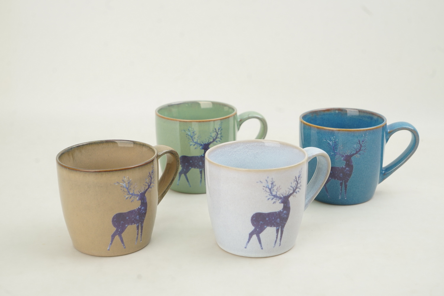 stoneware mug reactive glaze printing deer design