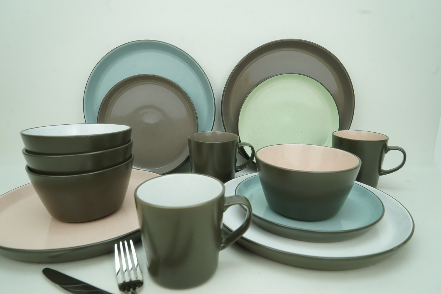 Stoneware dinnerware outside matte black inside with color