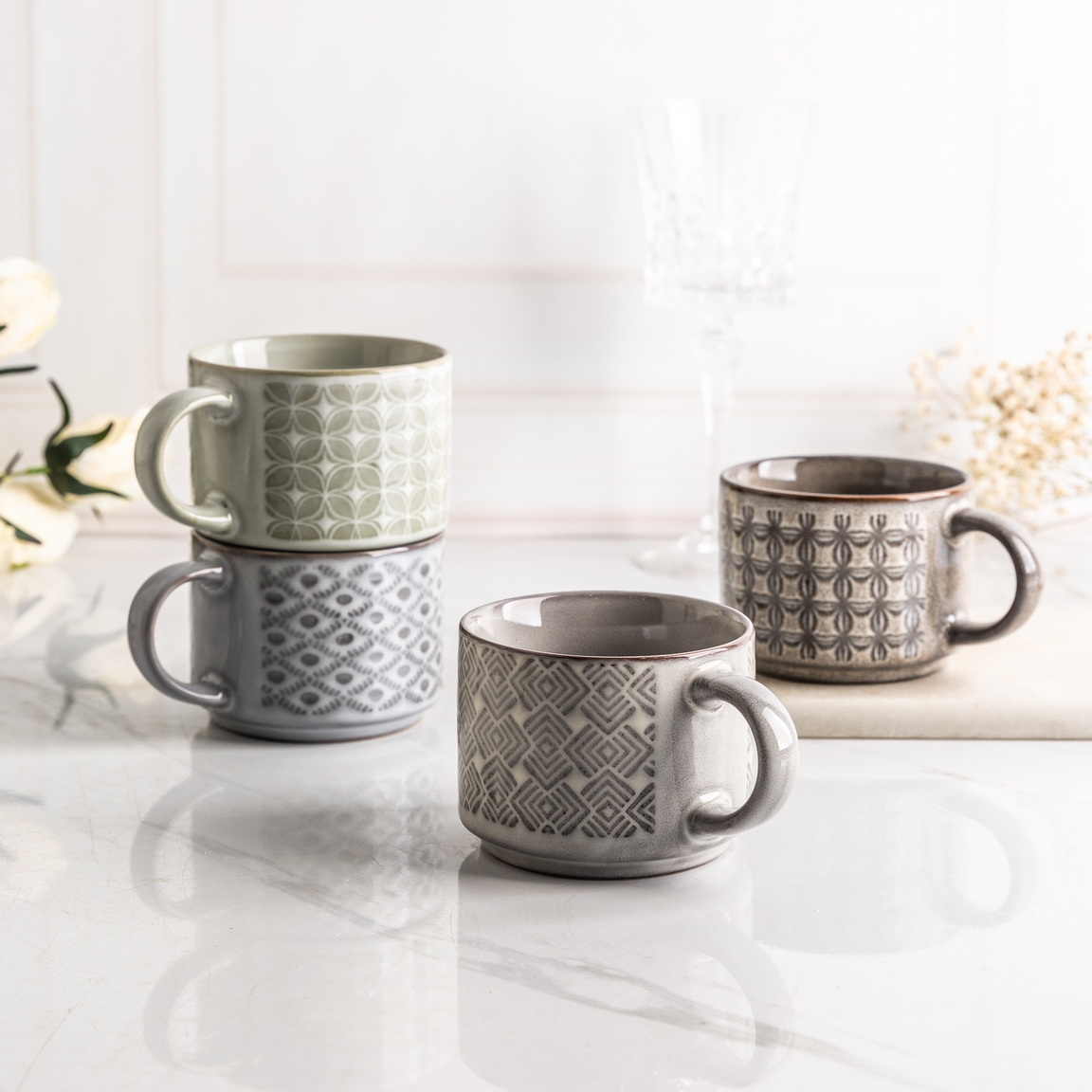 stoneware stackable mug set embossed pattern