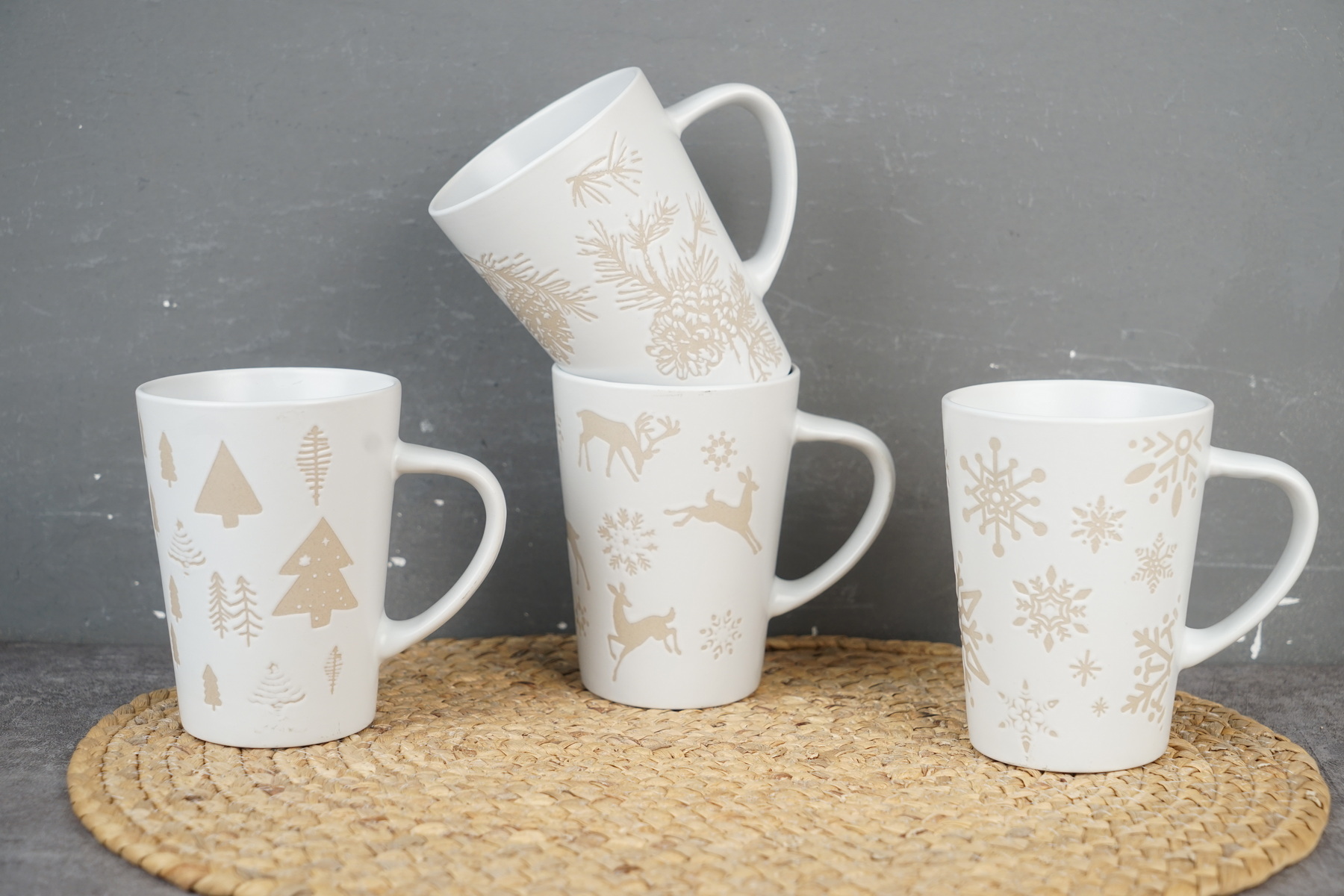 Stoneware conical mug embossed Christmas pattern K717